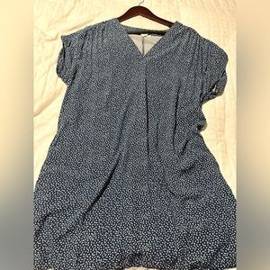 Mid length flowing blue dress